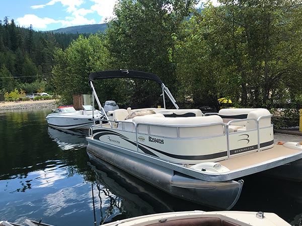 The Bennington Pontoon boat in the water.